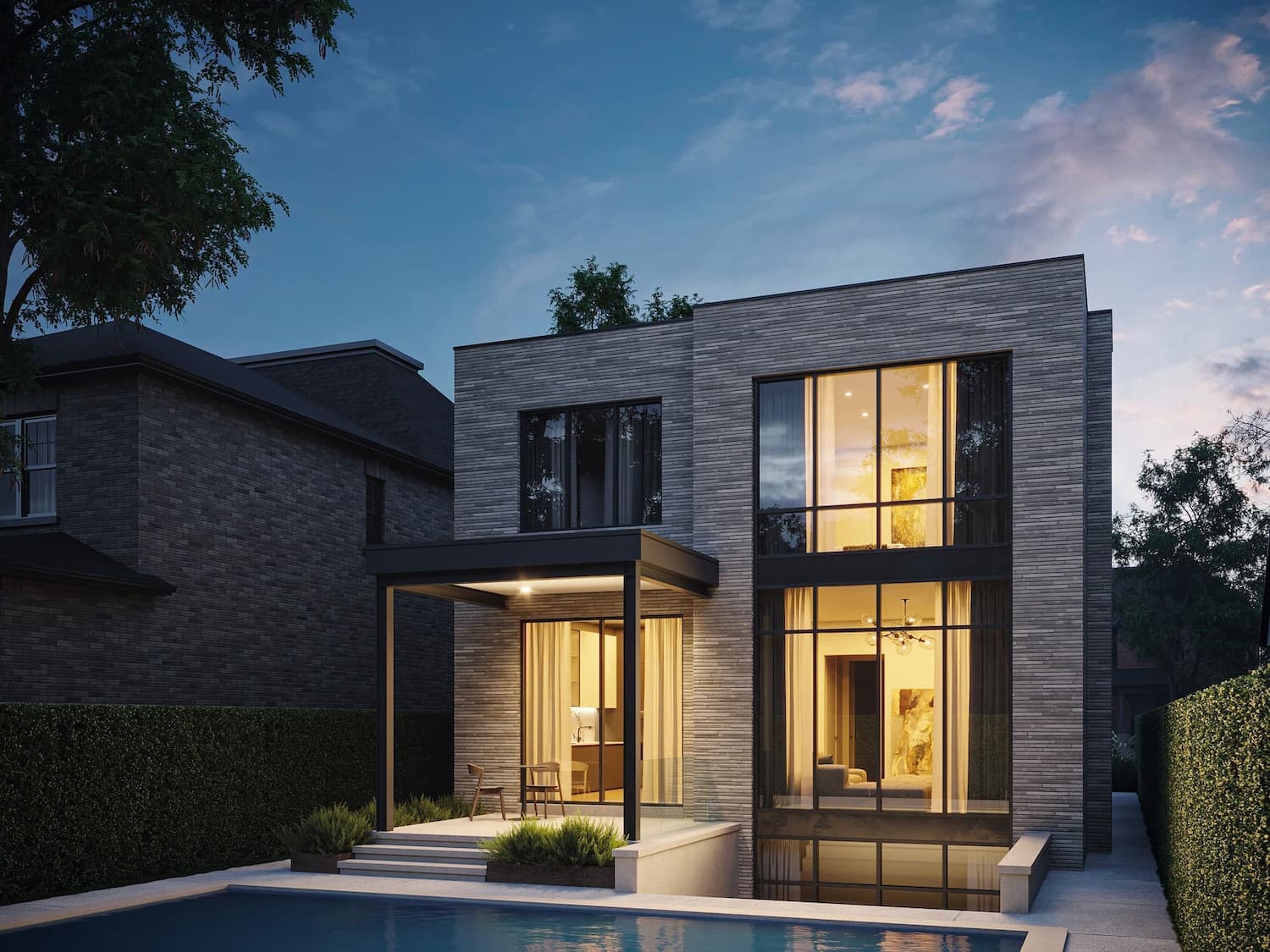 Contemporary light-brick house with a pool and warm evening lighting